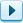 right-pointing arrow button that opens the pre-installed motifs panel