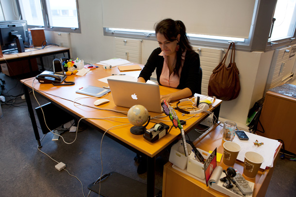 Yenny Otero at her desk.